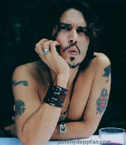 Shirtless Johnny Depp looks hot