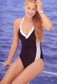 Anna Kournikova in black adidas swimming siute with white stripes