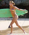 Anna Kournikova goes surfing