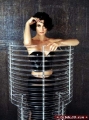 Carrie Anne Moss in silver tube