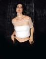 Carrie Anne Moss in white shimmy