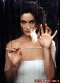  Carrie Anne Moss behind the glass