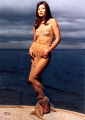 Catherine Zeta Jones posing in beautiful tight dress