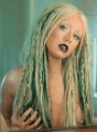 Christina Aguilera posing topless with strange hair