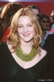 Drew Barrymore wearing black dress with plunging neckline