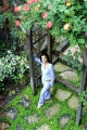 Eva Longoria posing in the garden