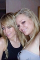 Hilary Duff smiling with a friend