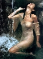 Jennifer Aniston posing in wet transparent dress