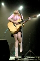 Jewel Kilcher wearing short skirt on concert