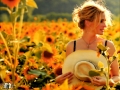 Hot Julia Roberts posing on the field of sunflowers