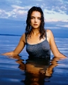 Wet Katie Holmes posing in the water