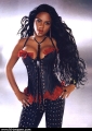Lil Kim wearing hot leather corset
