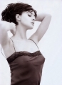 Monica Bellucci posing in hot black lingerie