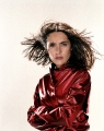 Salma Hayek posing in red sexy leather jacket