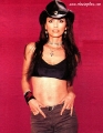 Shania Twain in cowboy hat wearing black hot shimmy 