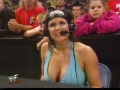Stephanie McMahon dressed in hot blue shimmy with sexy neckline