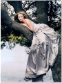 Reese Witherspoon posing in glamorous dress hanging on the tree
