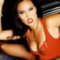 Tia Carrere wearing incredibly hot dress with sexy neckline