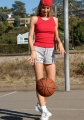 Tiffany Paris posing with the basketball