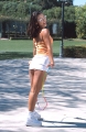 Adriana Sage in short skirt