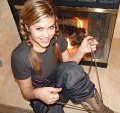 Teen Topanga striping off by the fireplace