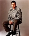 Adam Sandler sitting