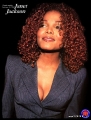 Janet Jackson in sexy jacket showing neckline