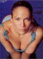 Jennifer Lopez posing in a blue sexy swimming suite