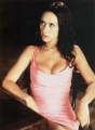 Jennifer Love Hewitt wearing pink dress with sexy neckline