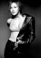 Jewel Kilcher wearing hot leather jacket