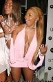 Lil Kim wearing hot dress with sexy neckline