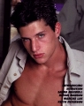 Simon Rex posing shirtless