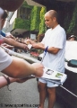 Andre Agassi giving autographs