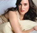 Jennifer Connelly posing in bed