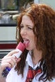 Red One from TATU is licking an ice cream