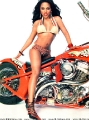 Lil Kim posing in hot bikini on the red harley davidson