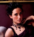 Jennifer Connelly posing in black dress